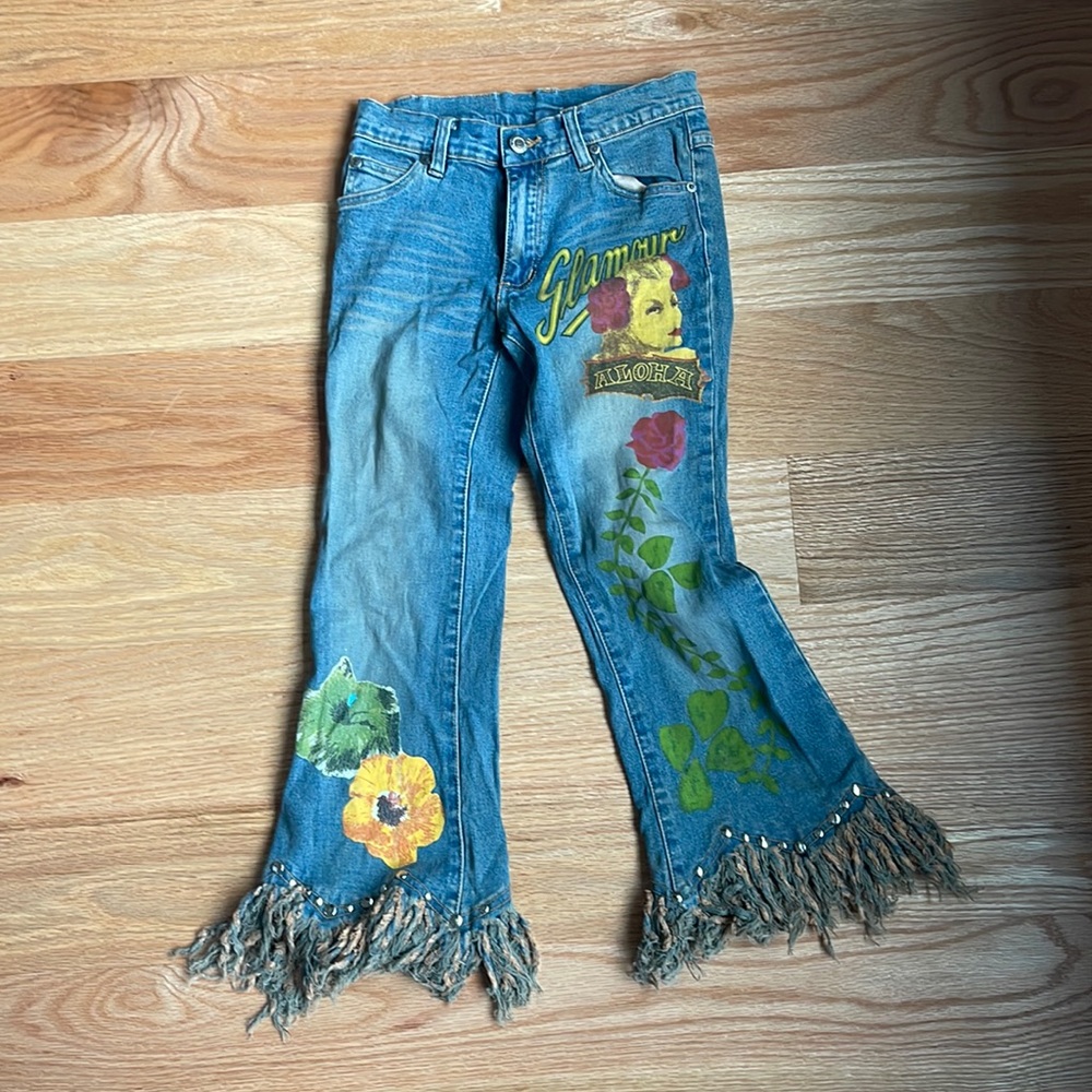 Lipstick jeans painted with frayed bottom